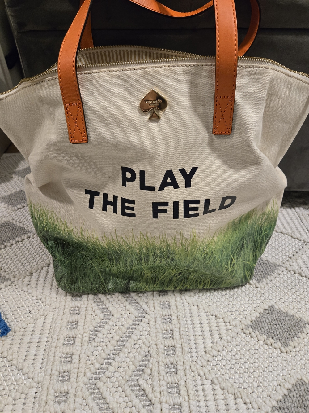kate spade canvas tote with orange leather straps and green grass print